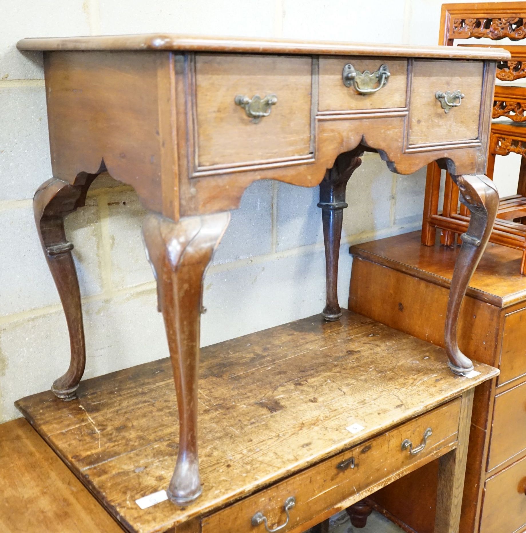 A George III walnut lowboy, width 80cm, depth 51cm, height 70cm